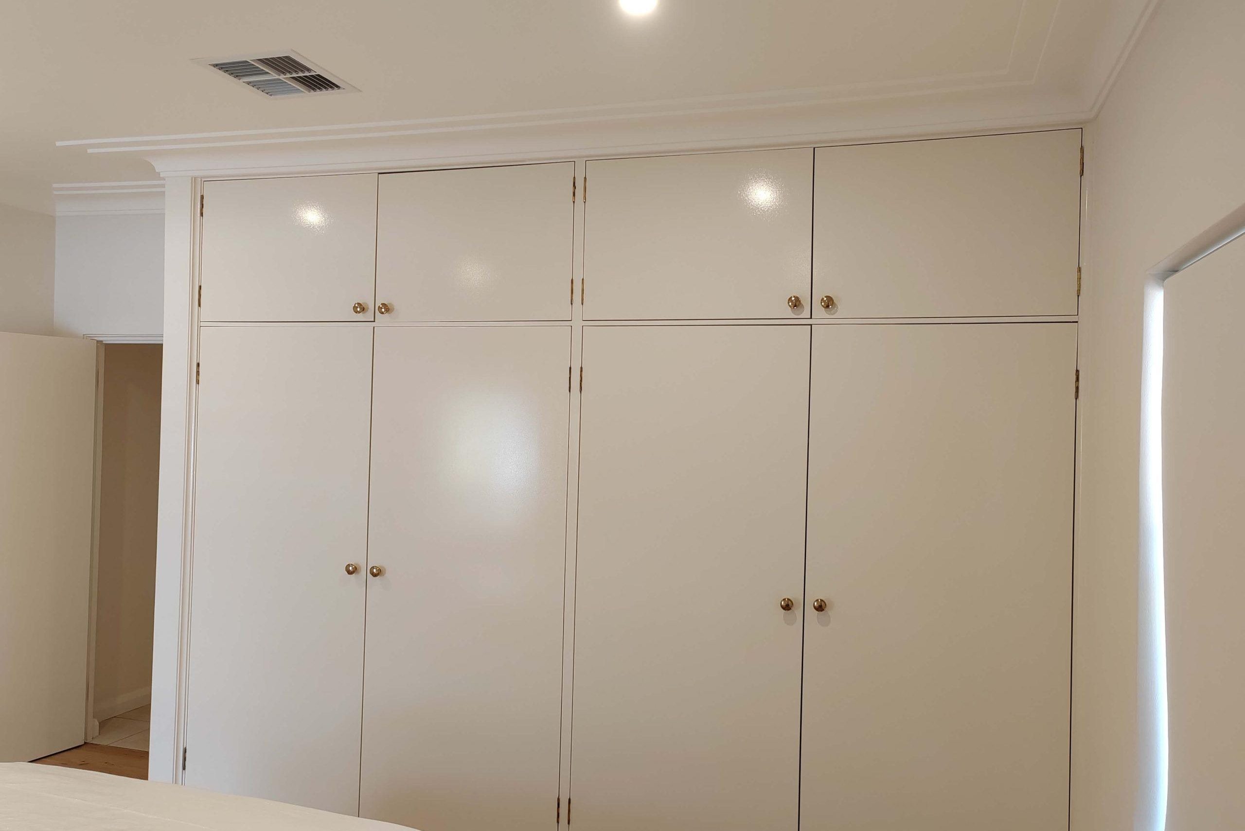 Living room interior with furniture covered for painting